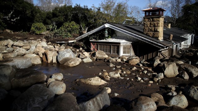 Debris from a mudslide covers a home on January 10, 2018, in Montecito, California.