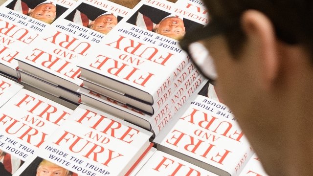 Customers purchase copies of one of the first UK consignments of Michael Wolff's book.