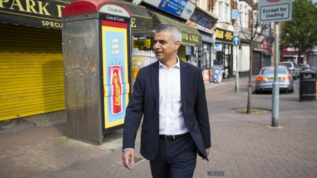 London Mayor Sadiq Khan walks down the street