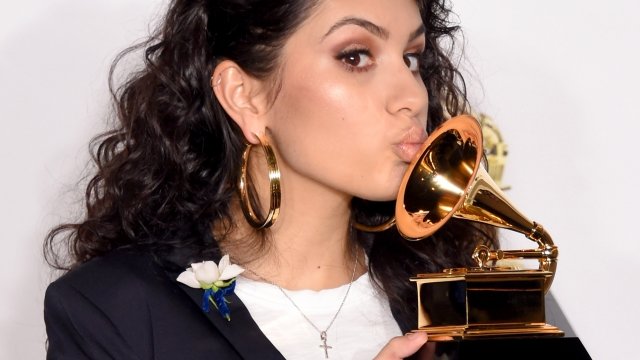 Alessia Cara holds Grammy award.