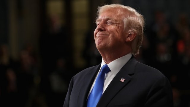 U.S. President Donald J. Trump smiles during the State of the Union address.