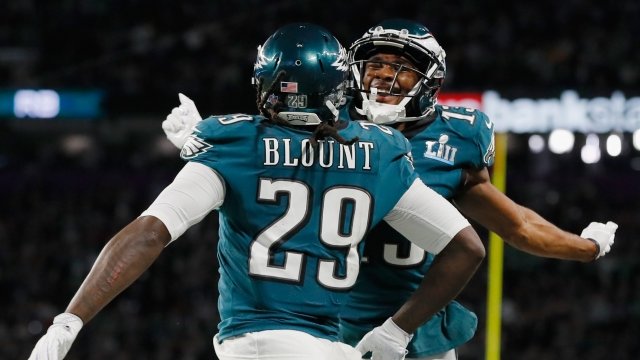 LeGarrette Blount and Nelson Agholor chest bump after a touchdown.