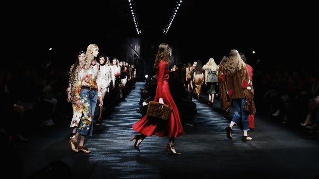 Models walk the runway.
