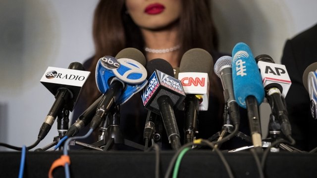 Microphones surround Weinstein accuser.