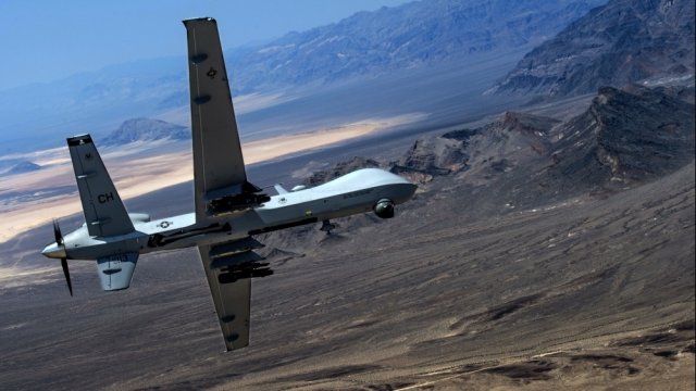 An MQ-Reaper flies over Creech Air Force Base, Nevada, June 25, 2015