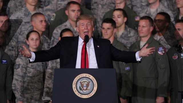 President Donald Trump speaks at an Air Force base