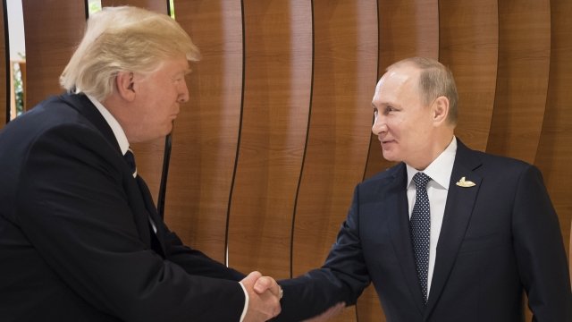 U.S. President Donald Trump and Russian President Vladimir Putin shake hands