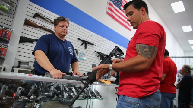 Man buying AR-15 Battle Entry Assault Rifle