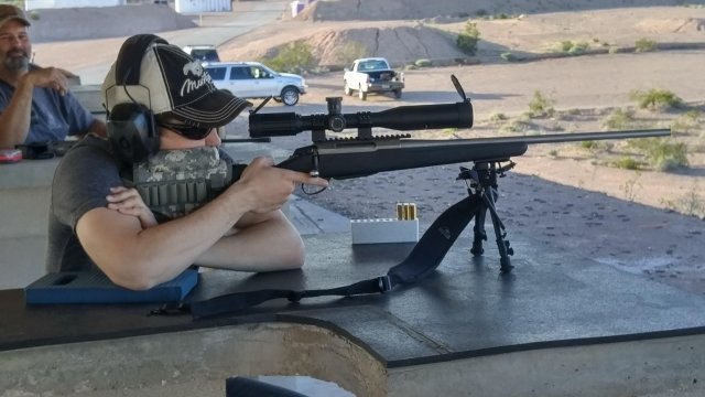 Student Tanner Ray at a gun range