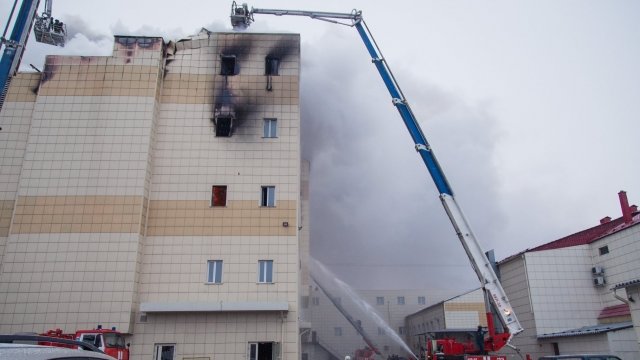 Firefighters fight the blaze at the Kemerovo mall