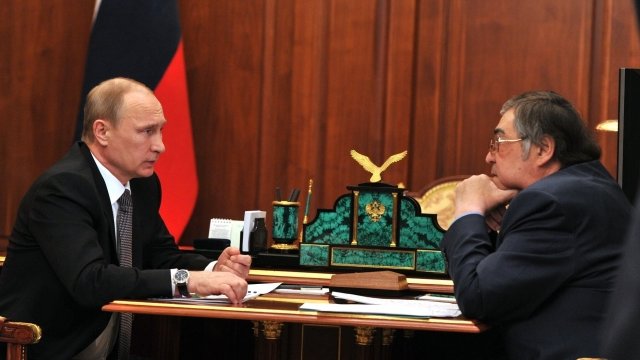 Russian President Vladimir Putin, left, with Kemerovo Gov. Aman Tuleyev