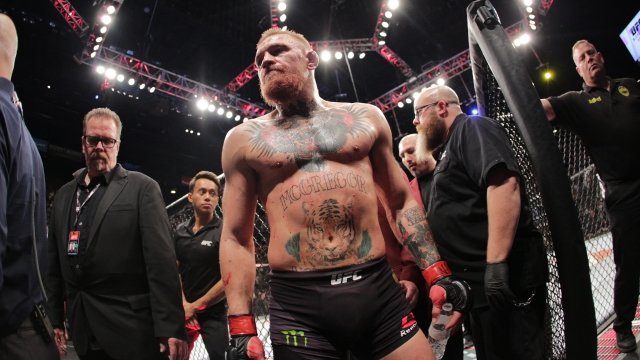 Conor McGregor leaves the octagon after a fight.