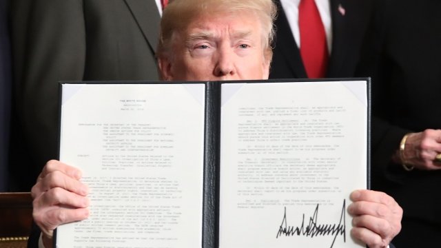 Trump signs tariffs