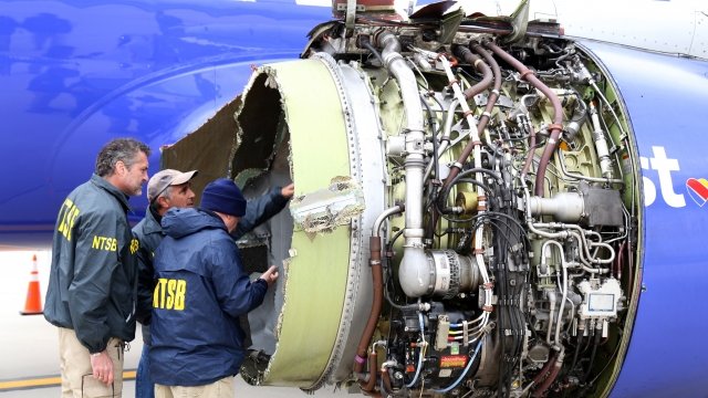 Inspectors examine Southwest Airlines engine