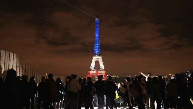 The Eiffel Tower is lit up in remembrance of the 2015 Paris attack victims