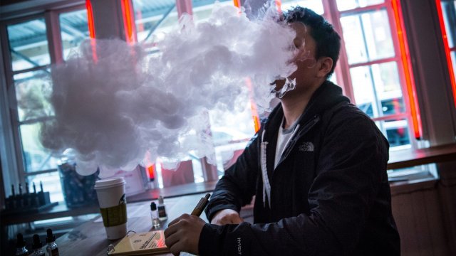 Person smoking e-cigarette