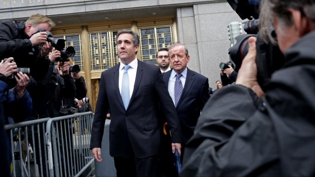 Michael Cohen leaves the federal courthouse.