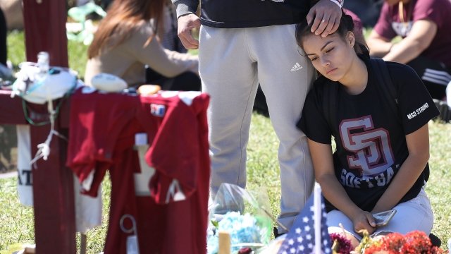People mourn the Parkland, Florida, school shooting
