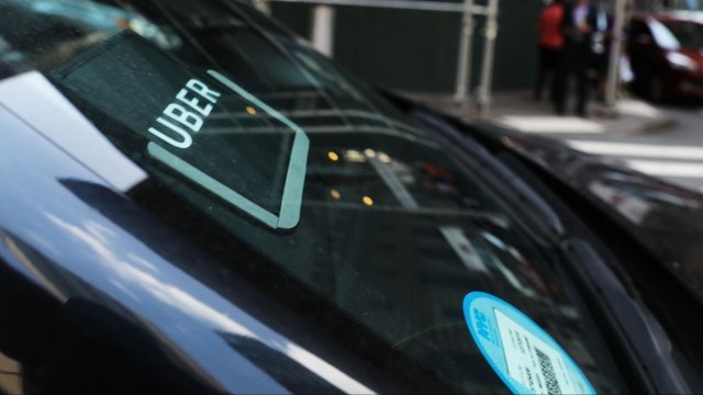 Uber sticker in car winow