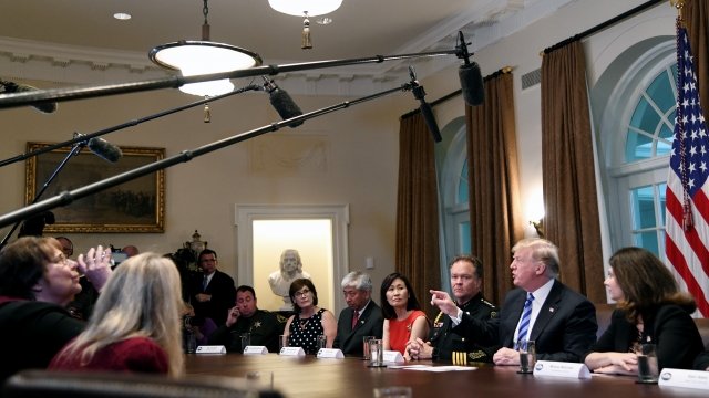 President Donald Trump speaks during a White House meeting