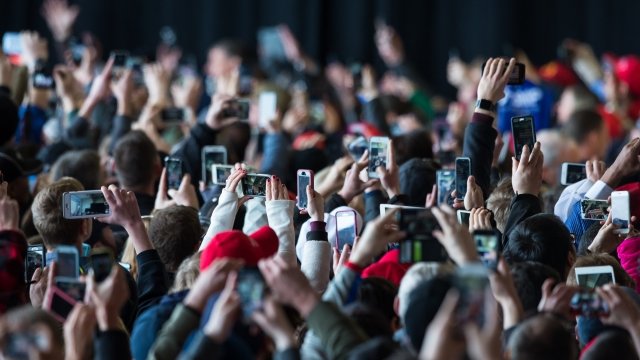 A crowd with smartphones