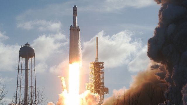 The SpaceX Falcon Heavy rocket lifts off from the Kennedy Space Center