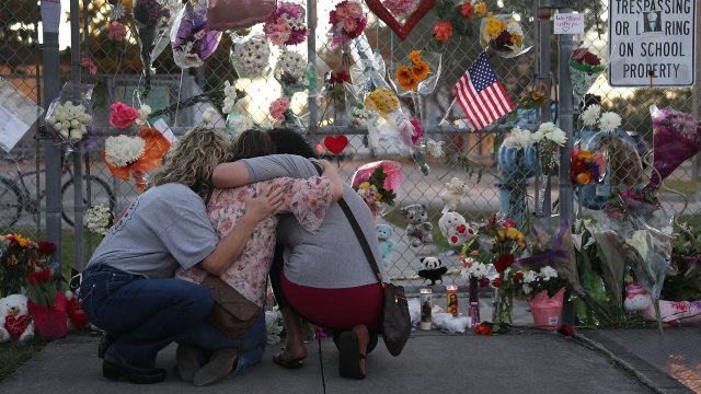 Parkland, Florida, shooting victims makeshift memorial in front of Marjory Stoneman Douglas High School.