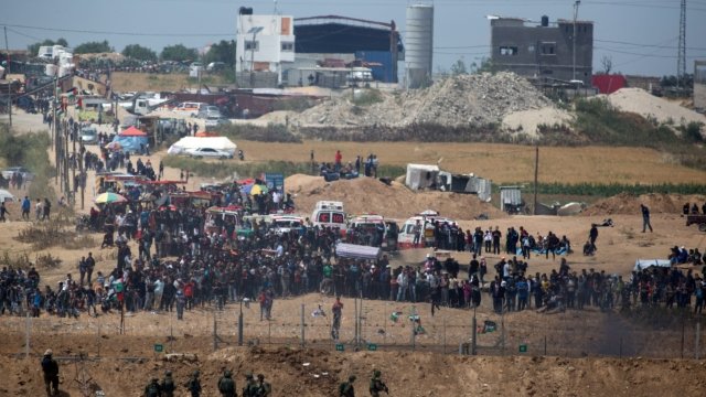 Palestinians gather for a protest on the Israel-Gaza border