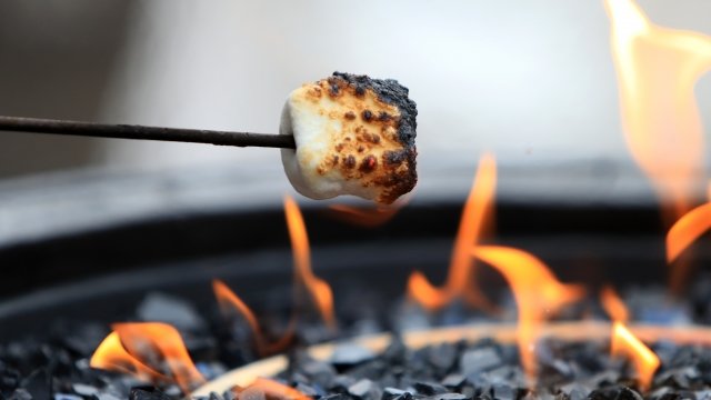 People make s'mores.