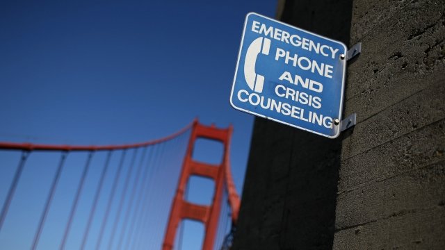 A sign for an emergency phone is seen on the span of the Golden Gate Bridge October 10, 2008 in San Francisco, California.