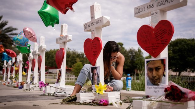A woman mourns for the Pulse nightclub victims