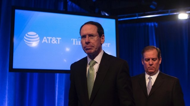 AT&T CEO Randall Stephenson and AT&T Senior Executive Vice President David R. McAtee II