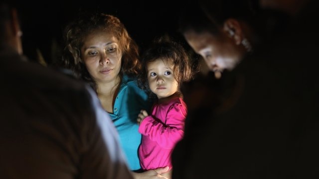 Central American asylum-seekers are taken into custody