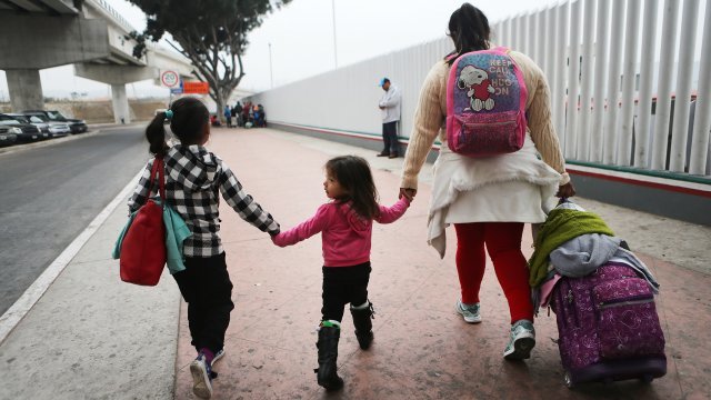 Migrant mother and her children