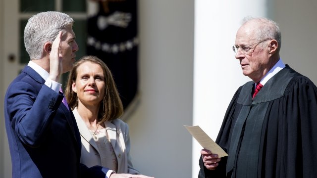 U.S. Supreme Court Associate Justice Anthony Kennedy administers the judicial oath to Judge Neil Gorsuch