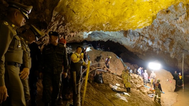Rescue crews search for a missing soccer team inside a cave in Thailand