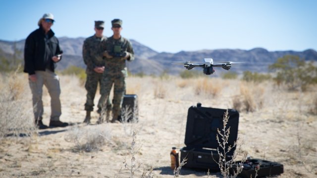 Marines practice operating a quadcopter as part of the "Quads for Squads" program