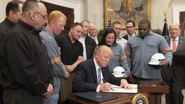 President Donald Trump signs steel and aluminum tariffs