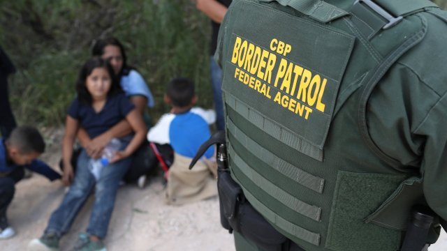 Undocumented immigrants and a Border Patrol agent
