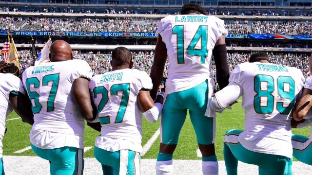 NFL players kneel during the national anthem.