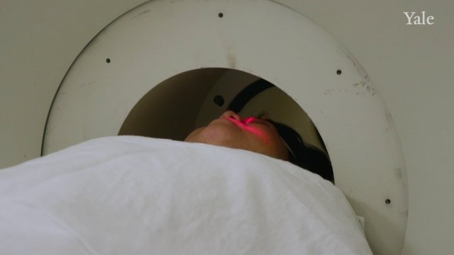 A patient in a PET scan