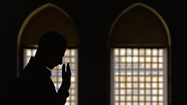 An Islamic student prays at the al Azhar mosque before heading into exams in Cairo, Egypt.