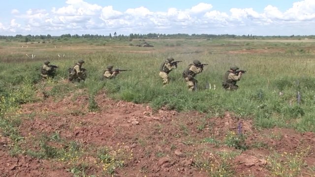 Russian military members participate in exercises