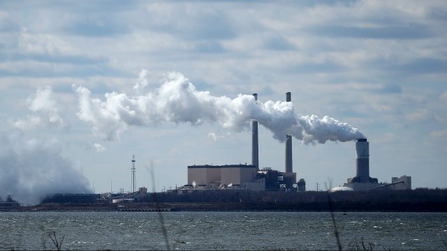 Emissions leave a stack at a coal-fired power plant