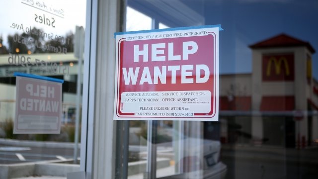 'Help Wanted' sign in a window
