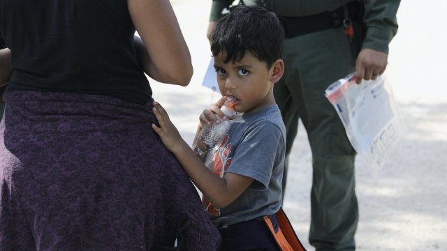 Migrant child staring into the camera