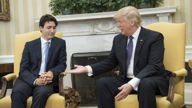 President Donald Trump and Canadian Prime Minister Justin Trudeau meet in the White House Oval Office in 2017.