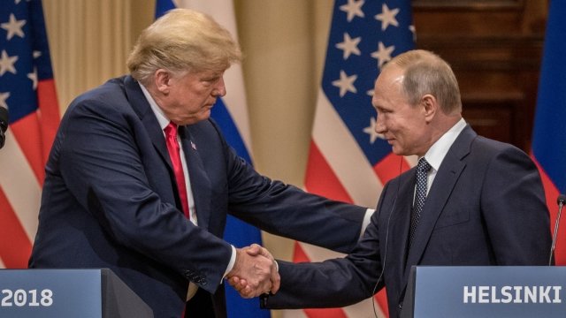 President Donald Trump shakes hands with Russian President Vladimir Putin during a summit in Helsinki, Finland, in July 2018