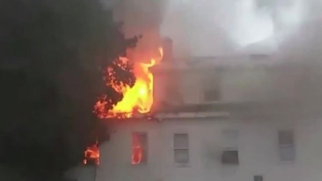 A fire burns a house in Massachusetts