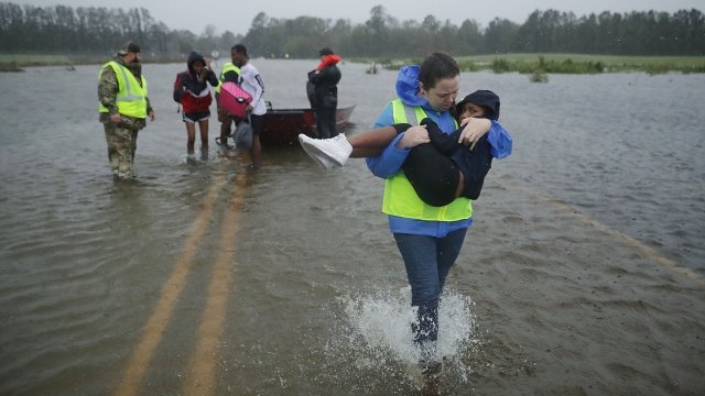 Volunteers help rescue residents from flooded homes in James City, North Carolina